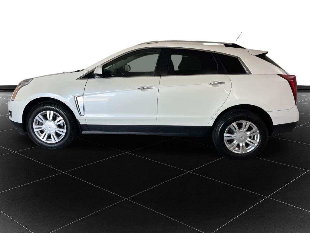 Used 2016 Cadillac SRX Luxury Collection with VIN 3GYFNBE37GS566129 for sale in Kansas City